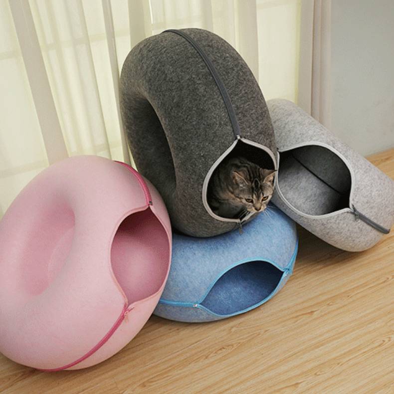 Felt Donut Cat Tunnel Bed in a living room