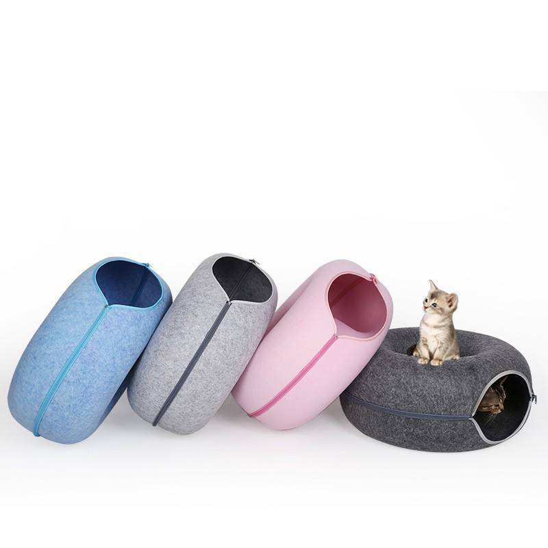Cat playing inside the Felt Donut Cat Tunnel Bed