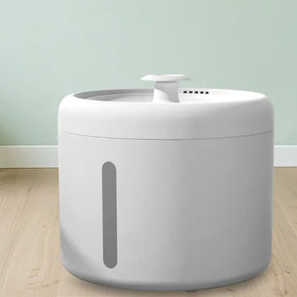 White cat water fountain with water level window on a wooden floor